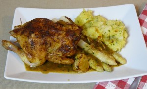 Gefülltes Stubenküken mit Spargel und Kartoffeln